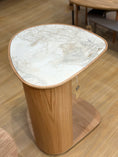 Load image into Gallery viewer, Wooden side table with marble-patterned top on a wooden floor