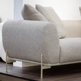 Load image into Gallery viewer, Gray sofa with beige cushions in a minimalistic room