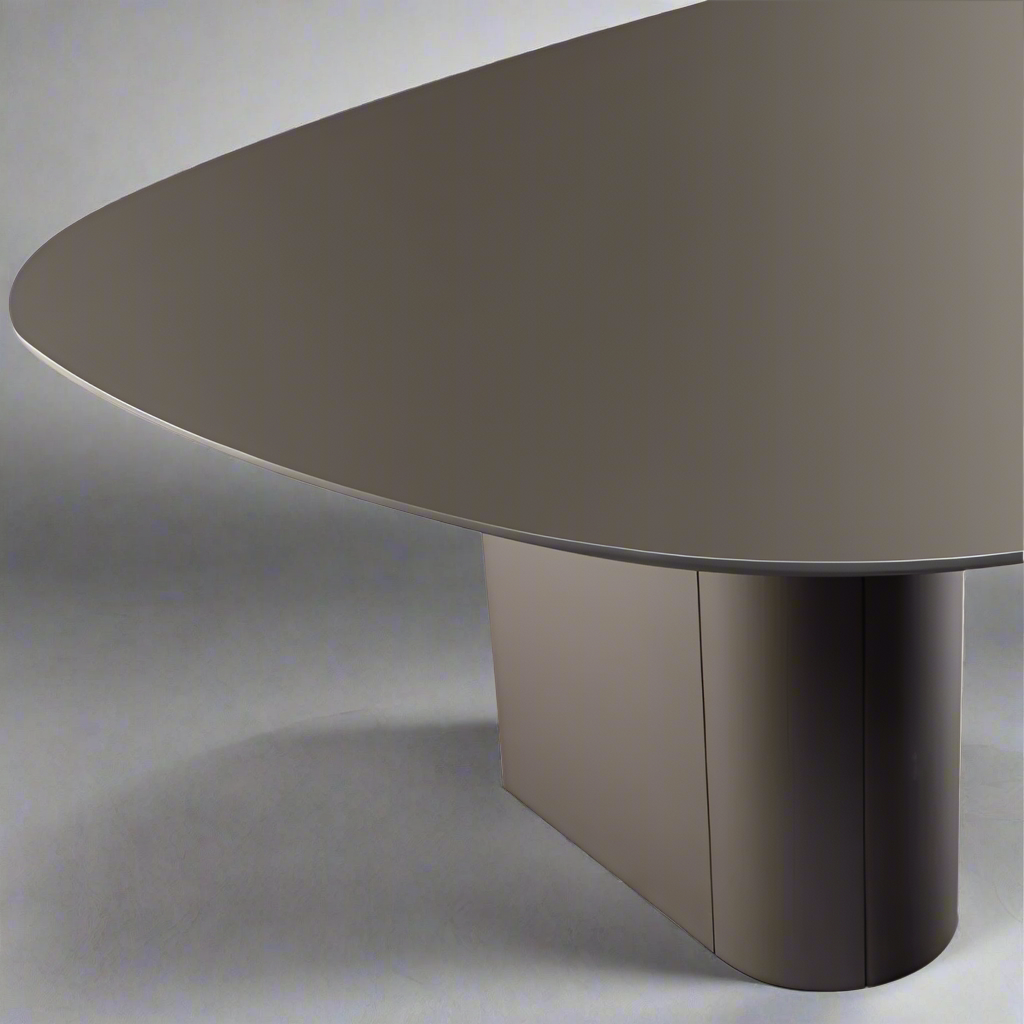 A contemporary design dining table with a smooth, oval-shaped wood tabletop in graphite color, supported by two cylindrical legs.