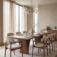 Load image into Gallery viewer, A modern dining room scene featuring a dark wood rectangular table surrounded by six upholstered dining chairs with dark wood frames, set on a textured light rug in a warm, neutral-toned room.