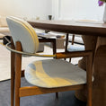 Load image into Gallery viewer, Chair with a patterned cushion in a dining room setting