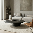 Load image into Gallery viewer, Modern living room with a gray sectional sofa, round black coffee table, and abstract painting on the wall.