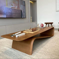 Load image into Gallery viewer, modern curved coffee table oak finish in a living room setting