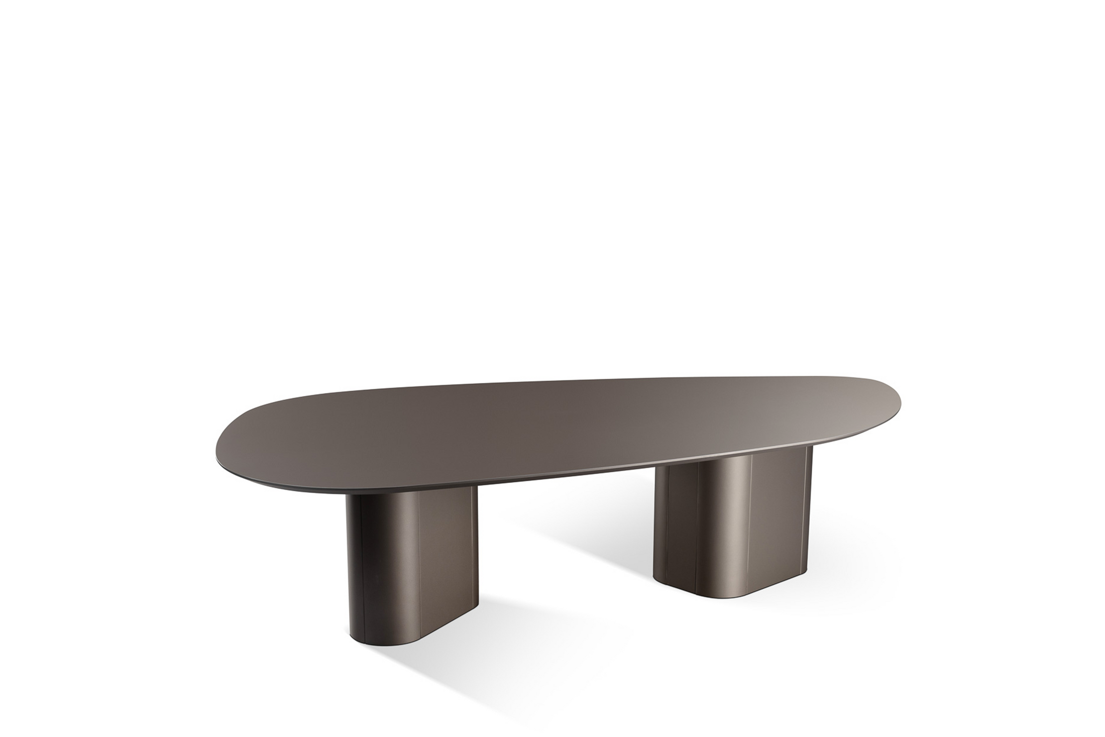 A contemporary design dining table with a smooth, oval-shaped wood tabletop in graphite color, supported by two cylindrical legs.
