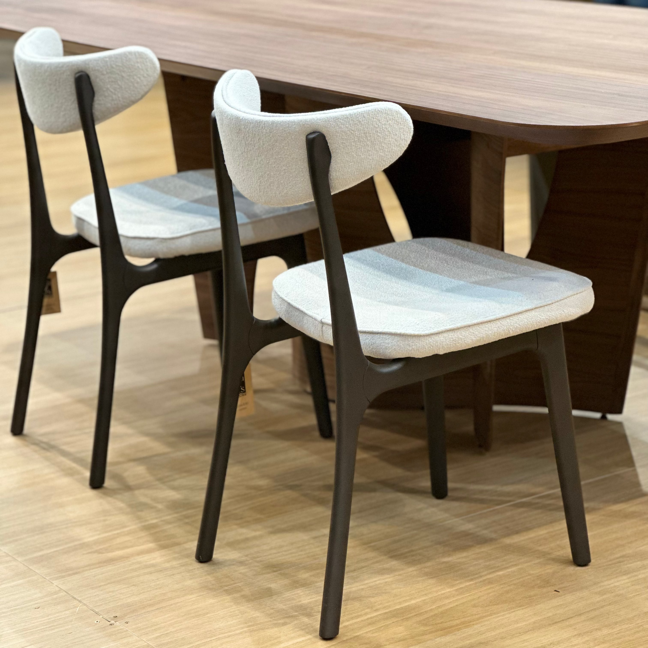 Dining table with chairs in a room setting