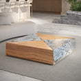 Load image into Gallery viewer, Modern coffee table with wooden finish and marble-patterned surface in a stylish interior setting.
