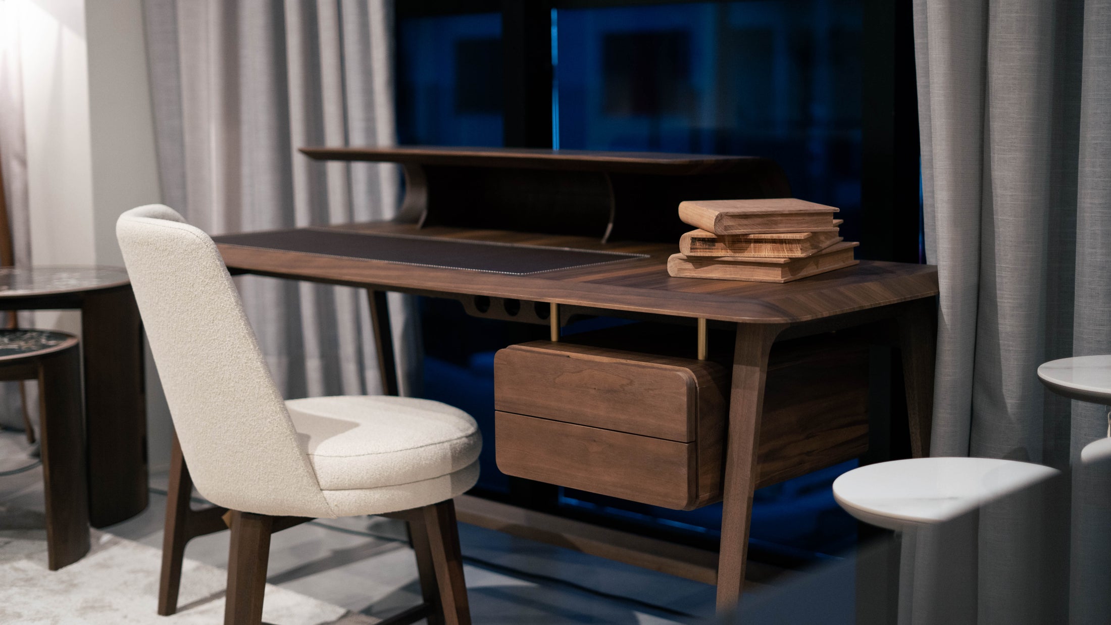 Wooden desk with chair in a room setting