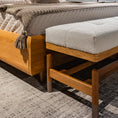 Load image into Gallery viewer, Wooden bed with beige bedding and a matching bench in a bedroom setting.
