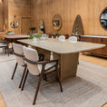 Load image into Gallery viewer, Modern dining room with wooden furniture and mirrors on the wall.
