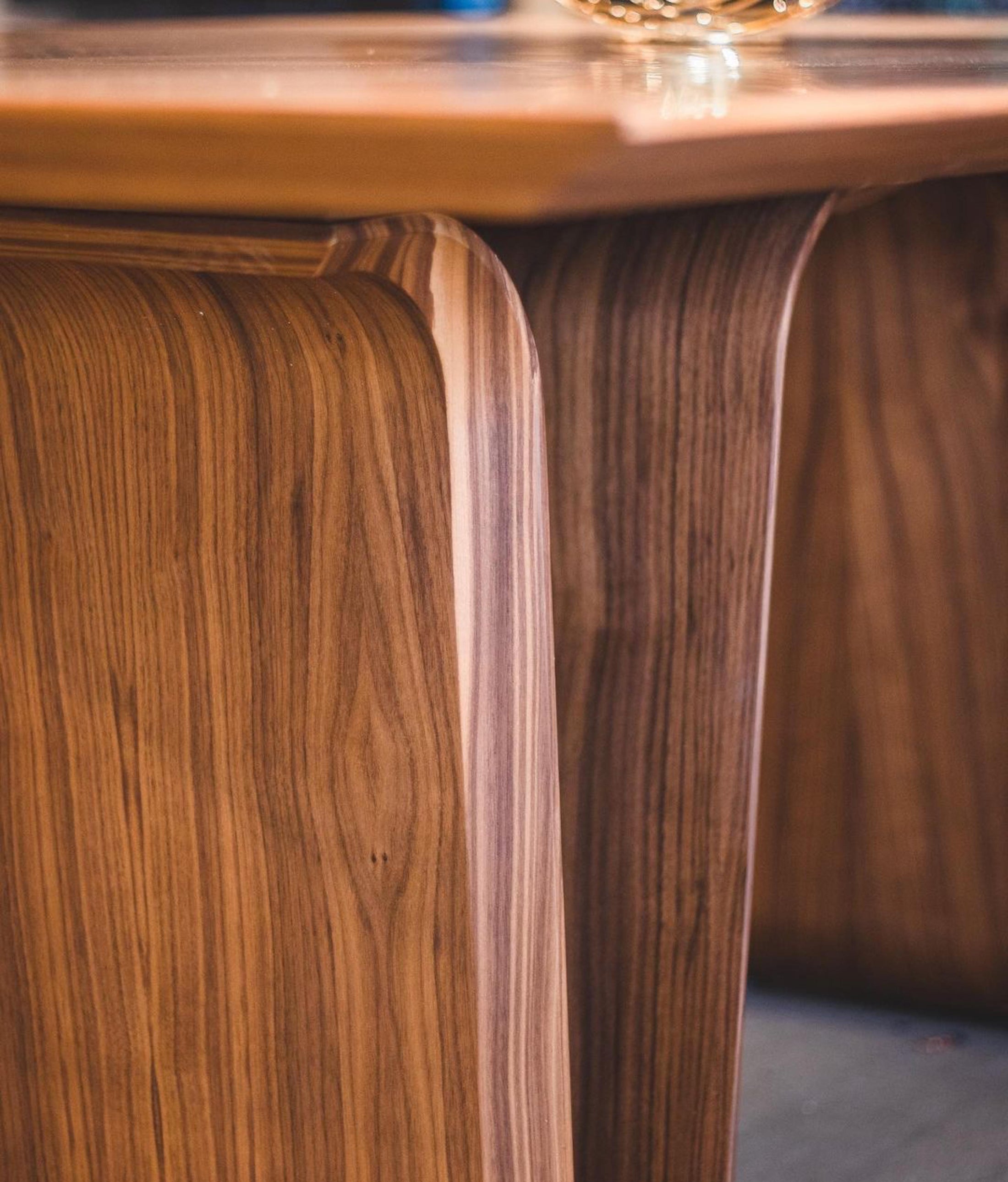 Close-up of emma wooden dining table with a glass top