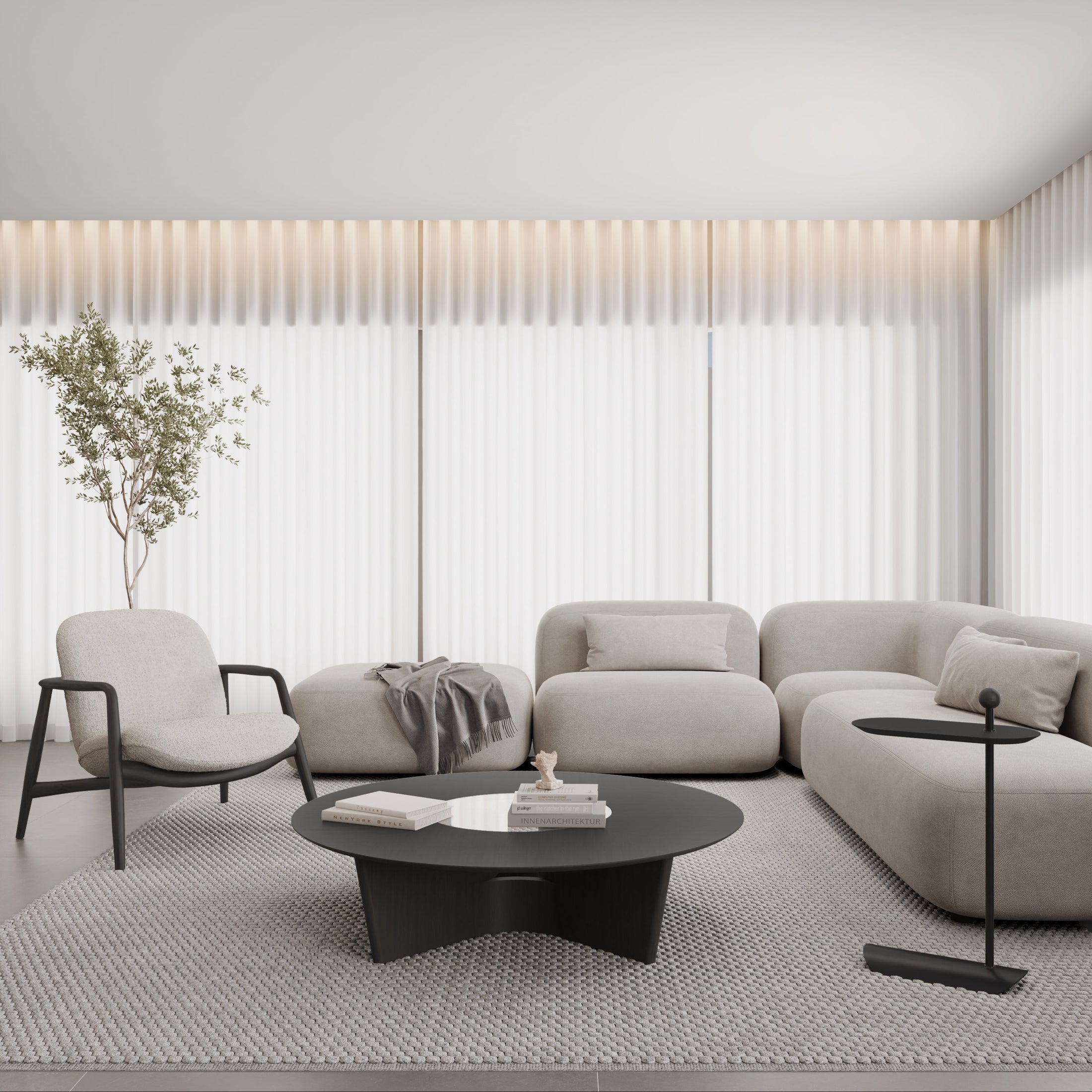 Modern living room with a beige sofa, armchair, and coffee table.