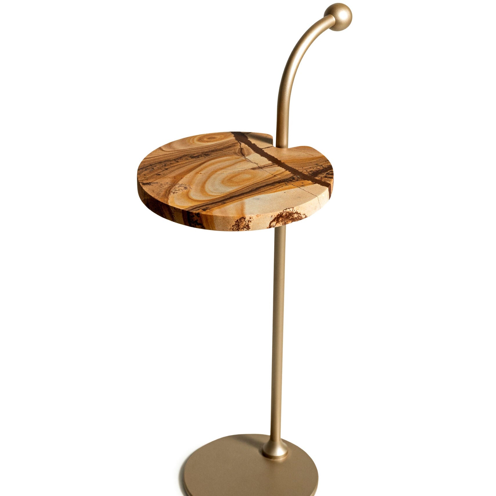 Small round table with marble top and gold metal base on a white background