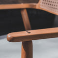Load image into Gallery viewer, Close-up of a wooden chair arm with a blurred background
