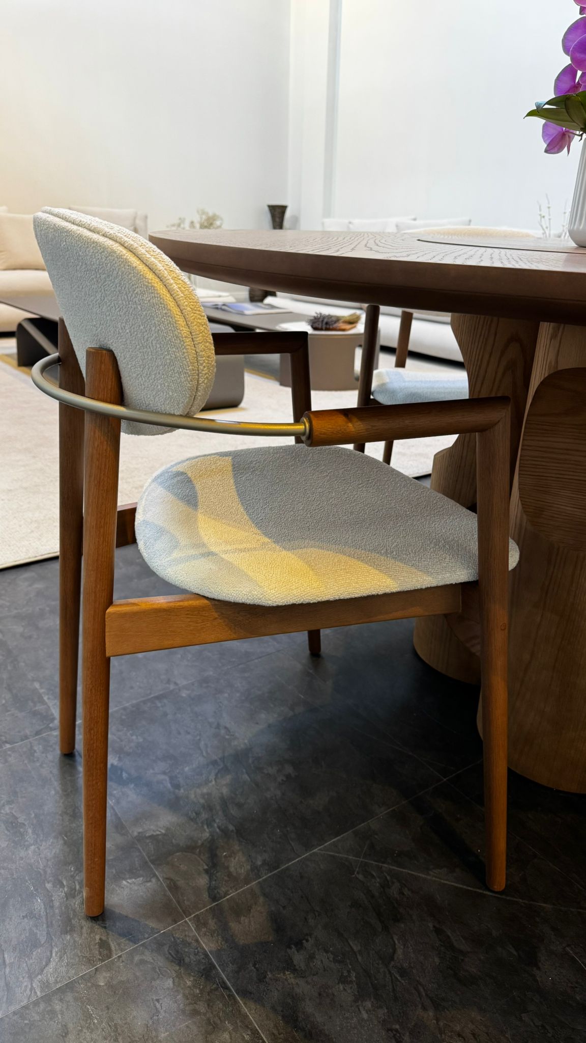 Chair with a patterned cushion in a dining room setting