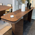 Load image into Gallery viewer, Modern wooden console table with decorative elements in a professional setting
