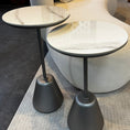 Load image into Gallery viewer, Modern sofa 2 round side tables in a stylish interior setting
