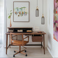 Charger l'image dans la visionneuse de la galerie, Modern home office with wooden desk, chair, and wall art
