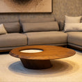 Charger l'image dans la visionneuse de la galerie, Modern living room with a sectional sofa and wooden coffee table.
