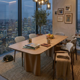 Load image into Gallery viewer, Modern dining room with city skyline view, wooden table, and chairs.
